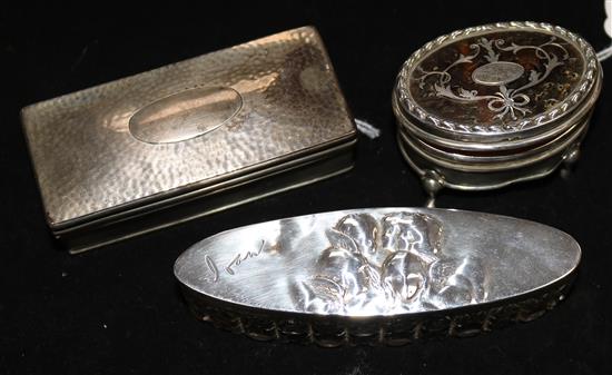 A silver and inlaid tortoiseshell trinket box, a silver ring box, Chester 1906 and a navette-shaped silver-mounted glass box